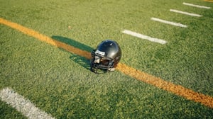 Black-Football-Helmet-on-Field_Hero-Image