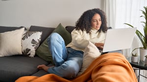 Woman-Watching-TV-On-Laptop_Hero-Image